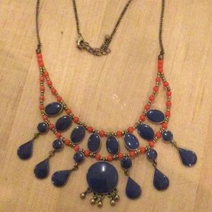 Bib neckclace with lapis color stones